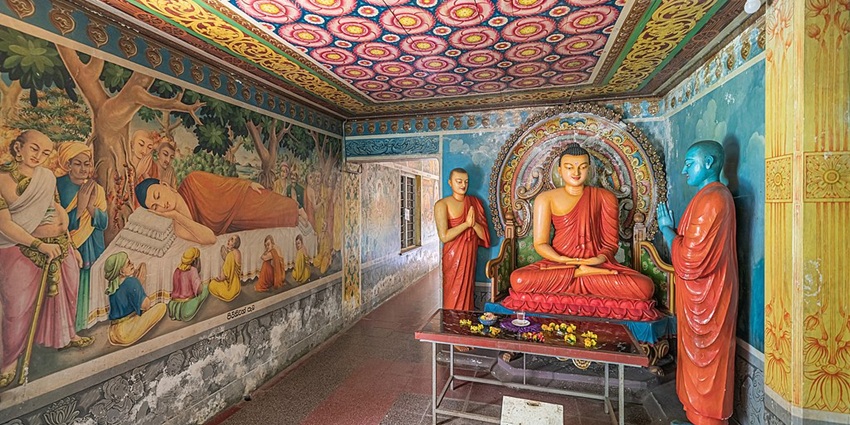 Explore the historic Dhowa Rock Temple and its ancient carvings.