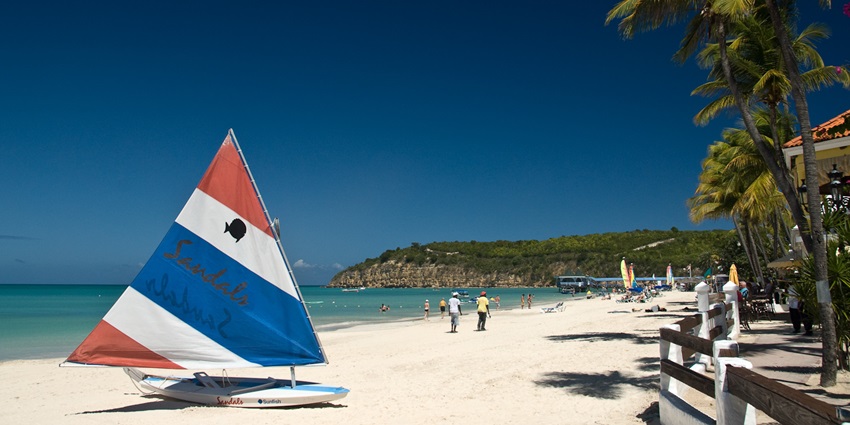 An image of Dickenson Bay in Antigua, one of the common places to visit in Antigua.