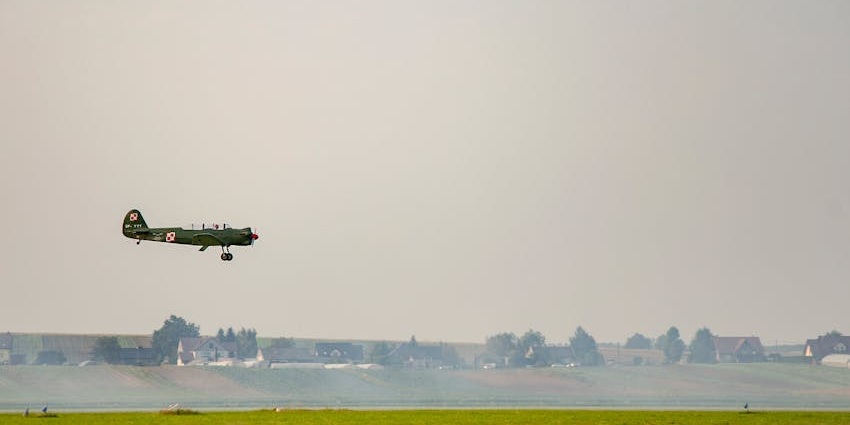 A view of small green airplane landing at Dikhil Airport, one of the airports in Djibouti.