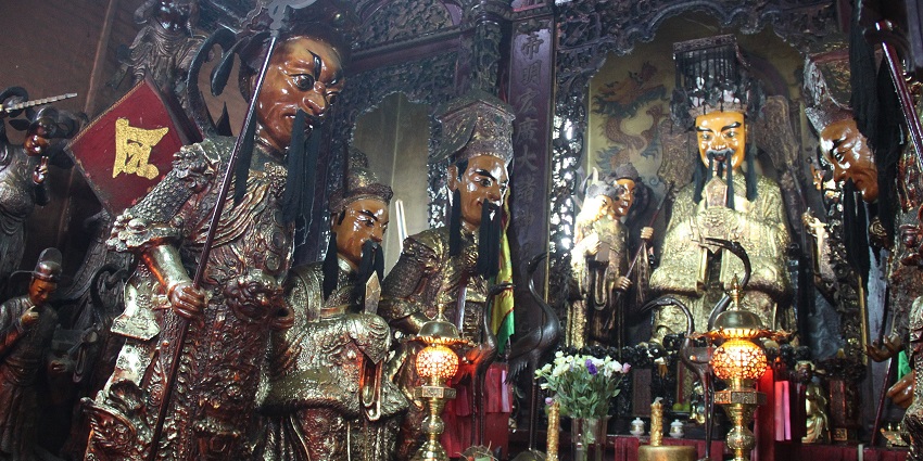 Intricately designed Jade Emperor Pagoda with beautiful sculptures and incense-filled air.
