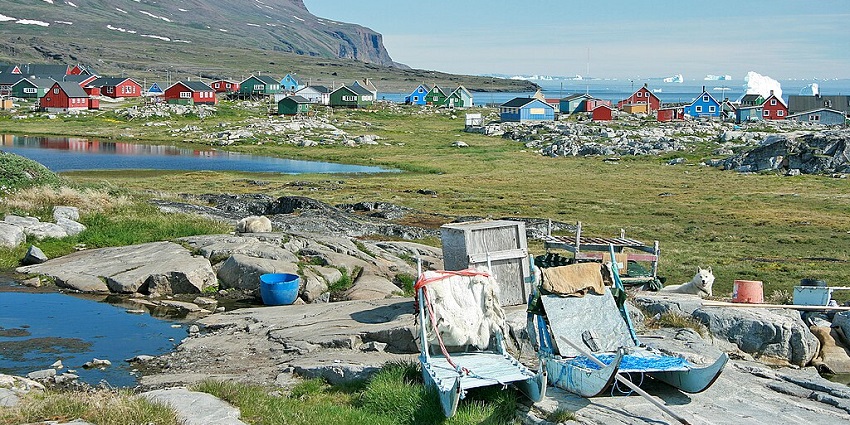 A remote island featuring towering ice cliffs, volcanic landscapes, and diverse wildlife.