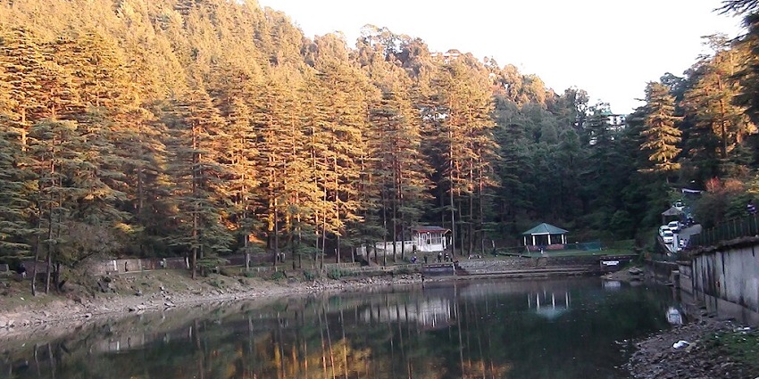 A Lake with a greenish water body reflecting trees similar to Dodra Kwar Lake in Narkanda
Viewers of this file can see comments and suggestions