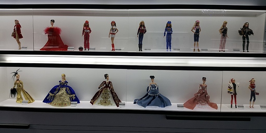 A collection of Barbie dolls at the Doll Museum of Castell d'Aro, showcasing her timeless style and elegance