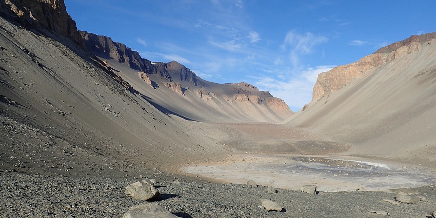 Don Juan Pond, one of the saltiest lakes in the world, with shallow waters in a rocky valley