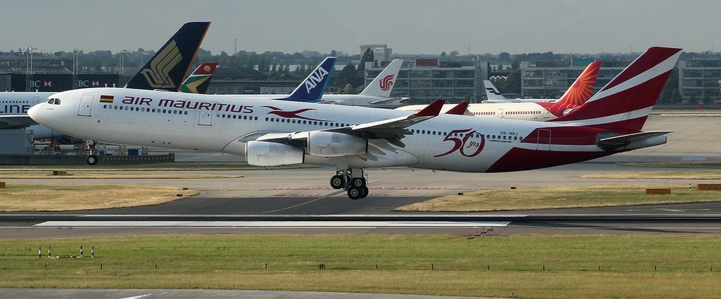 Air Mauritius aeroplane taking off at Dr Antonio Agostinho Neto International Airport.