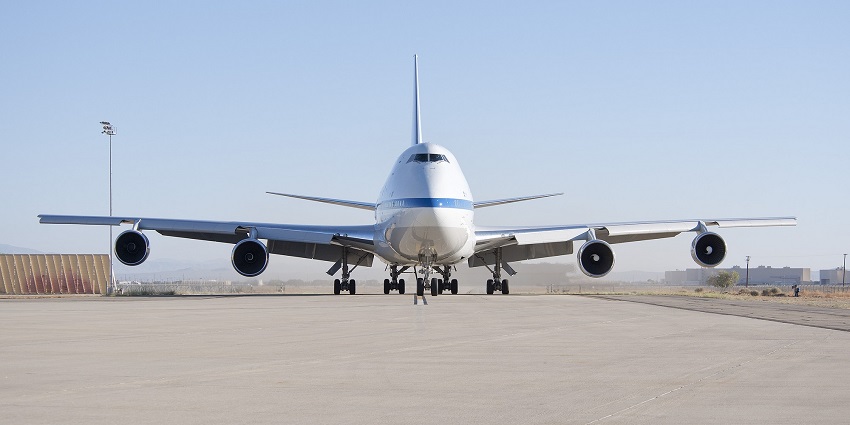 A large commercial aircraft at one of the airports in Paraguay is positioned on the runway, preparing for its next flight.