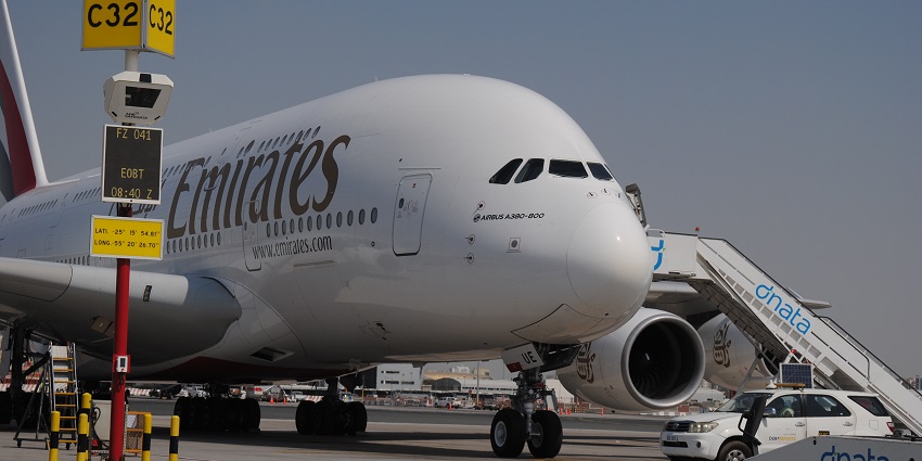 An Emirates Airplane parked at Dubai International Airport, the best airport in the world.