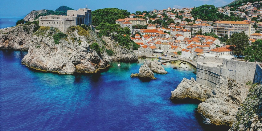 Places to visit in Europe in May include the city walls and admire breathtaking views.
