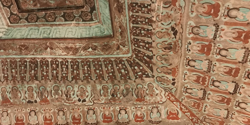 Vibrant murals at Dunhuang Mogao Buddhist Caves revealing profound spiritual mastery