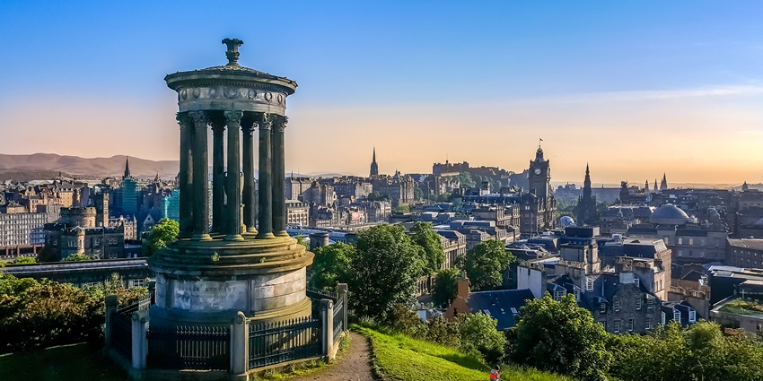 An image showing the skyline of Edinburgh, Scotland, featuring historic and modern architecture