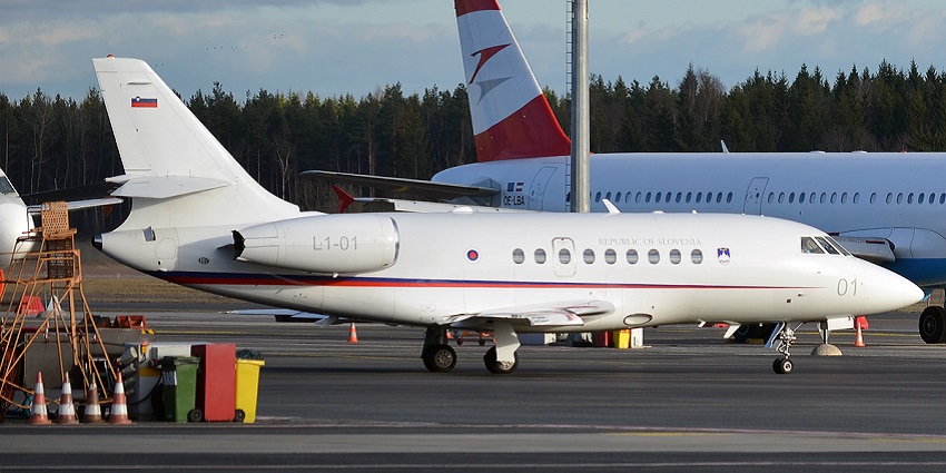 A white aircraft awaiting the arrival of the passengers to be taken to their destinations