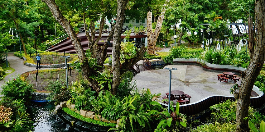 Unwind in this tranquil park, surrounded by lush greenery and stunning coastal views.