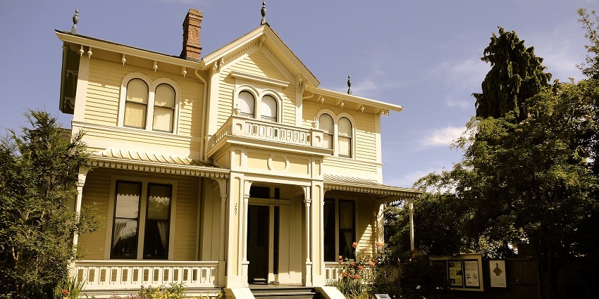 An image of the Emily Carr House, a Victorian-style yellow house, which is one of the great museums in Victoria.