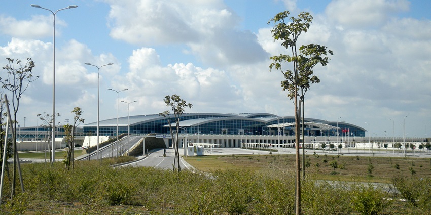 Enfidha Hammamet International Airport with a jungle view and a road leading to the terminal