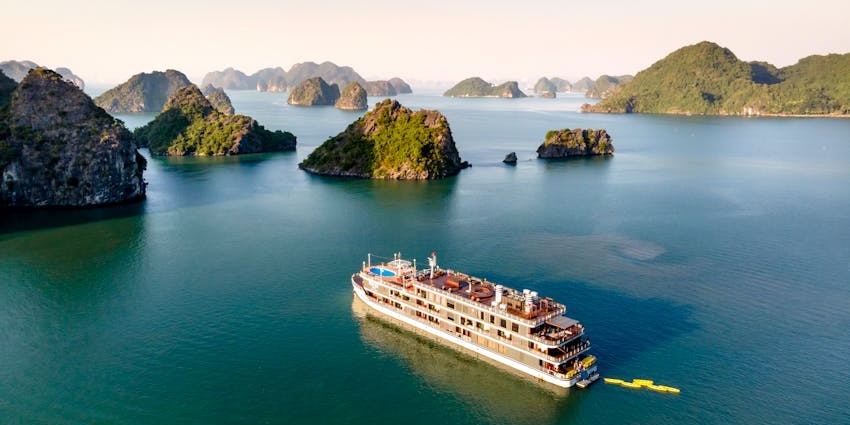 Sail through turquoise waters and explore different islands on a luxury cruise.
