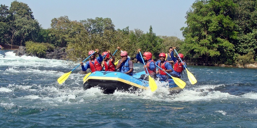 An image of people river rafting in Punakha, one of the best things to do in Bhutan