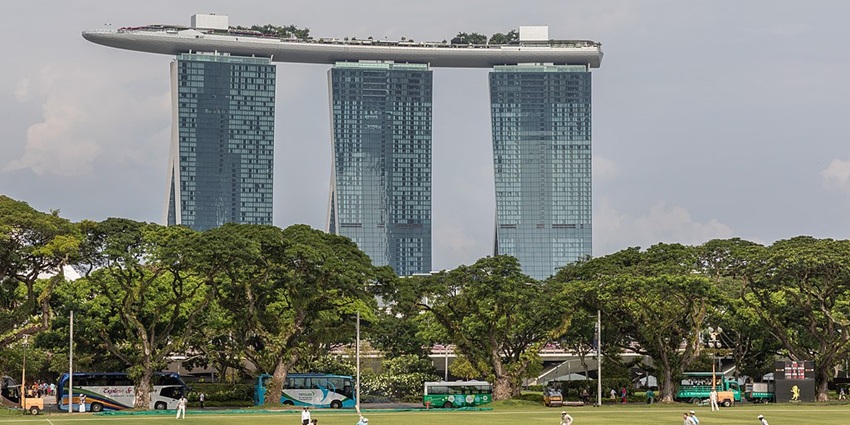Enjoy stunning panoramic views of Marina Bay from the Helix Bridge in Singapore.