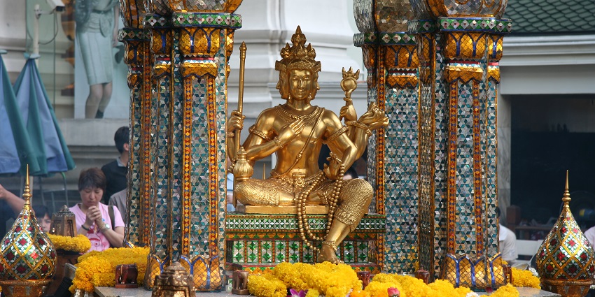Photograph of Erawan Shrine, where tourists pray and offer their prayers in Bangkok.