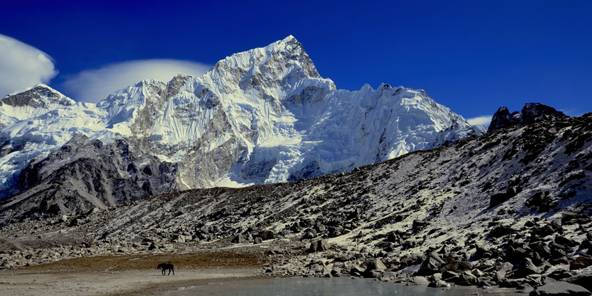 A mountain range at the Everest Base Camp Trek, one of the places for trekking in February.
