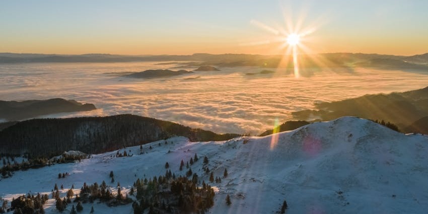 High altitude sunrise with snowy mountain range similar to Gurudongmar Lake in October