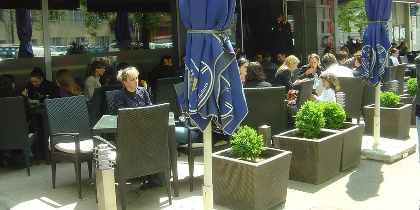 A picture of a bustling cafe in Pristina, which is one of the best things to explore in Pristina