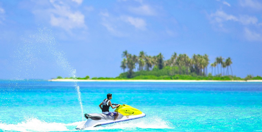 Things to do in Maldives include exploring the vibrant marine life with a thrilling underwater scooter adventure.
