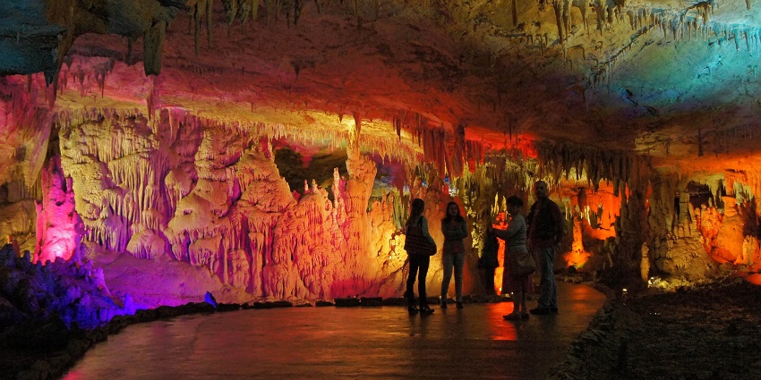 Fascinating cave system with stalactites, stalagmites, and underground rivers