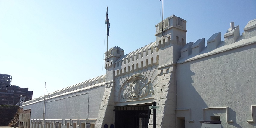 Constitution Hill is a white fort-like building with two towers, battlements and ornate details.