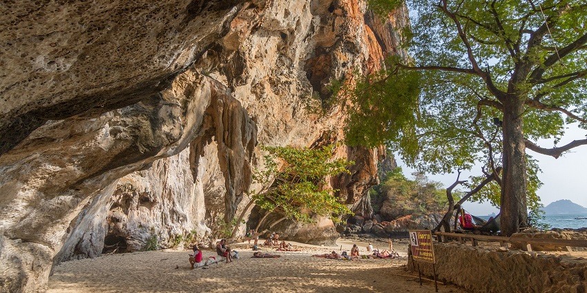 Admiring the Phra Nang Cave entrance is a must at this destination.