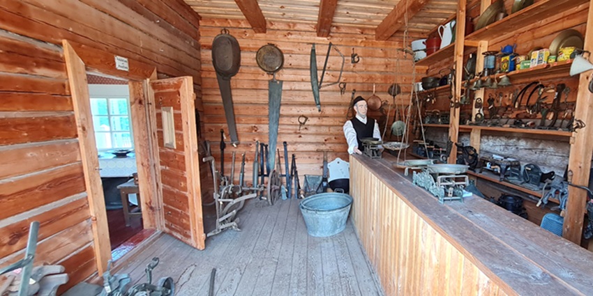 Traditional wooden buildings at the Open-Air Museum showcasing Lithuanian heritage.