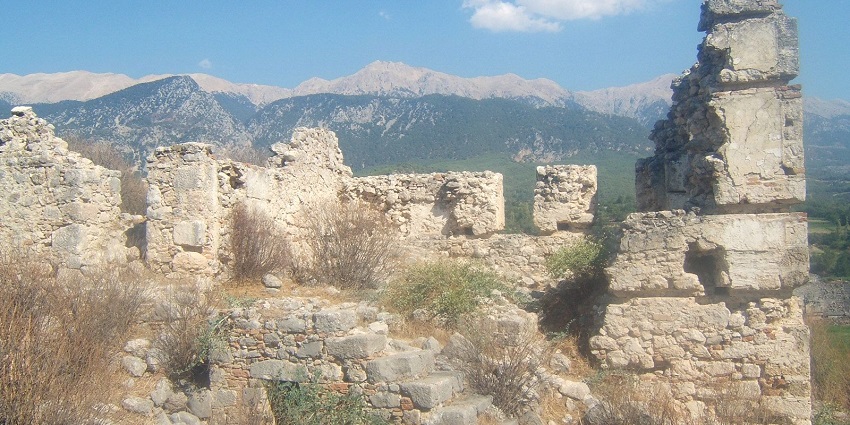 An image of Tlos ruins in Turkey with ancient stone structures, showcasing Things To Do in Fethiye.