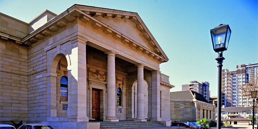 Exploring the art gallery with stone steps, one of the things to do in Johannesburg.