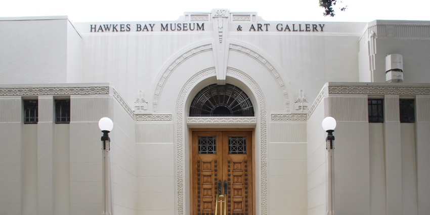 View of Hawkes Bay Museum & Art Gallery entrance, highlighting symmetrical stairs and ornate architecture.