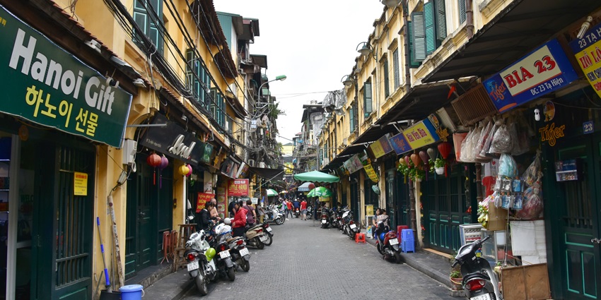 An image of people exploring the Old Quarter, one of Hanoi's best things to do.