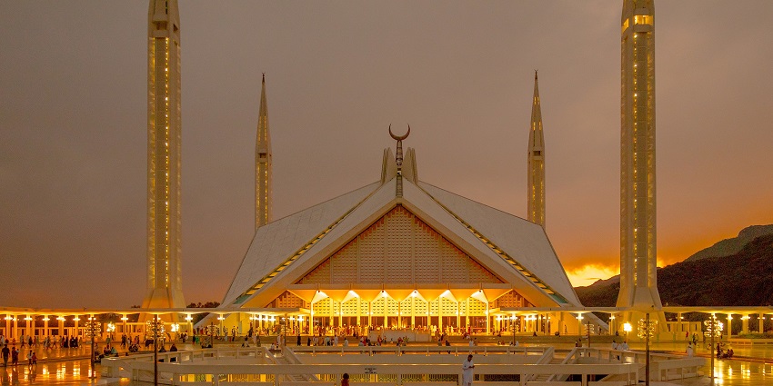 The Faisal Mosque is seen at sunrise with its beautiful architecture.