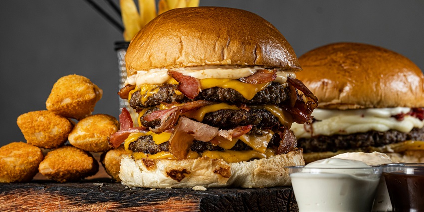 The exotic gourmet burger in three layers with stuffing, the best food in New Zealand.