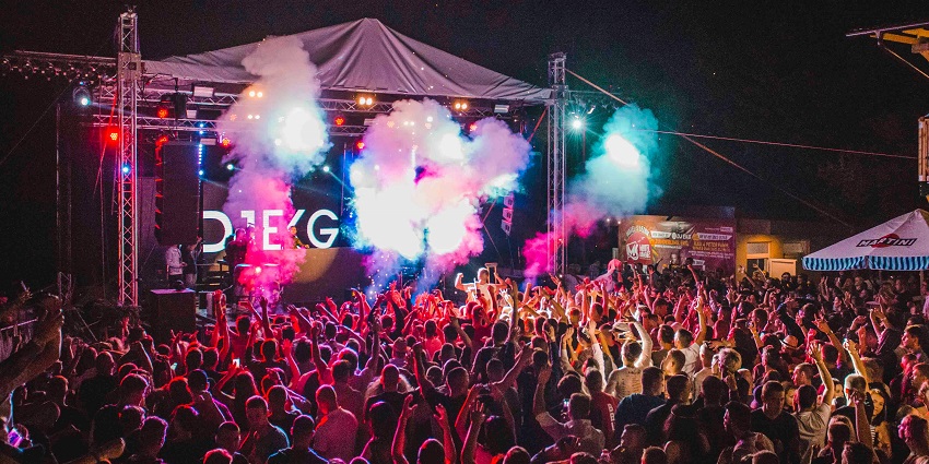 Image of people dancing and partying at Fiction Nightclub, a famous Jamaica nightlife spot.