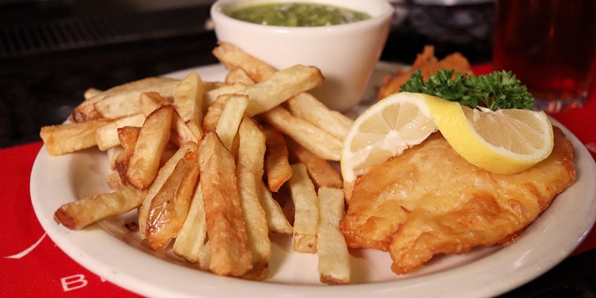 An image showing fish and chips from Britain, one of the famous foods in London.