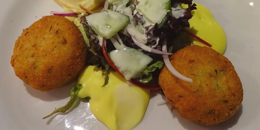 Crispy Thai fish cakes served with sweet and spicy dipping sauce, best food in Krabi