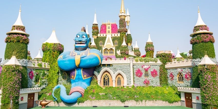 Iconic Disney characters beautifully recreated with vibrant flowers and lush greenery