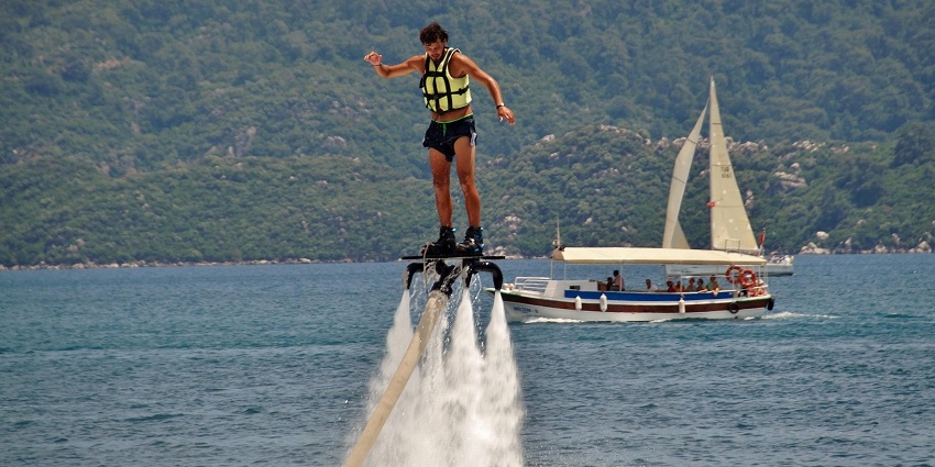 A person enjoying flyboarding, one of the popular adventure sport in Goa