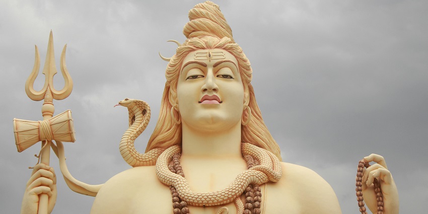 Statue of Lord Shiva in a meditative pose with a serene expression