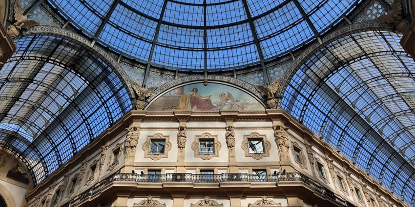 The grand and symmetrical domes of Galleria Vittorio Emanuele II in Milan.