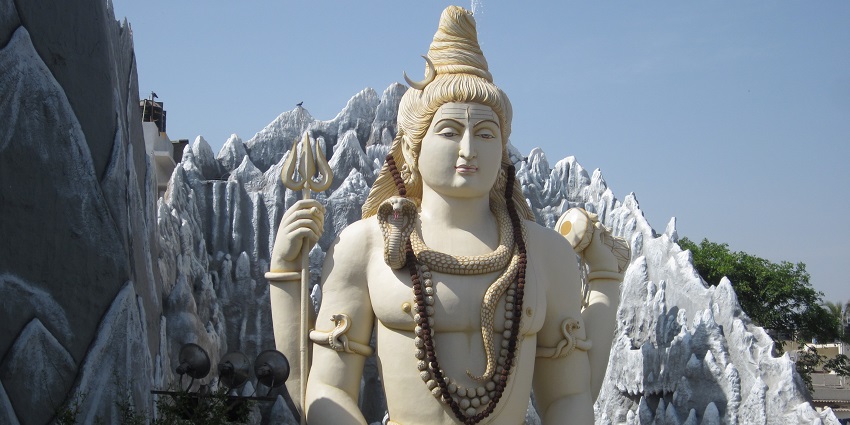 Statue of Lord Shiva in a meditative pose with a serene expression