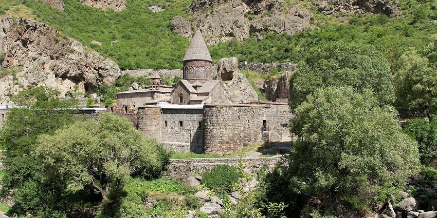 An Armenian UNESCO site, partially carved into the rock, showcasing stunning medieval religious art.