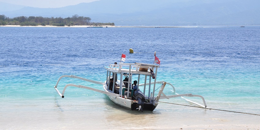 A lively beach bar setting on Gili Trawangan Island, offering the best nightlife in Gili.