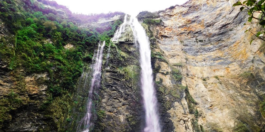 Trek through lush jungle to see one of the world’s tallest waterfalls in Peru.