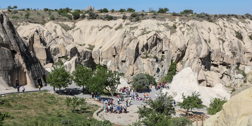 A picture of Göreme Open-Air Museum, showing ancient cave churches and frescoes.