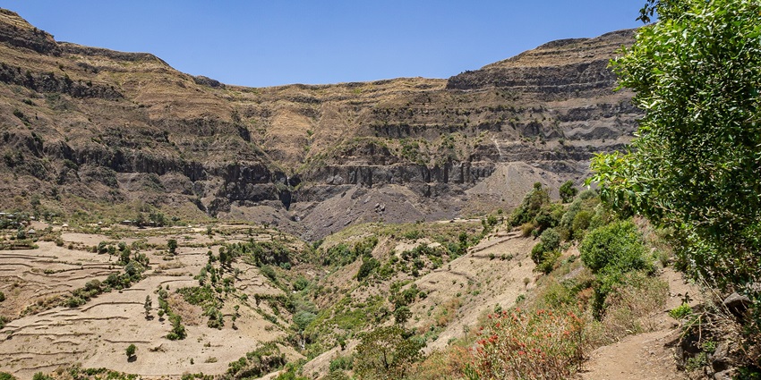 Scenic view of the Great Rift Valley with hills, greenery, and cloudy sky–places to visit in africa in october
