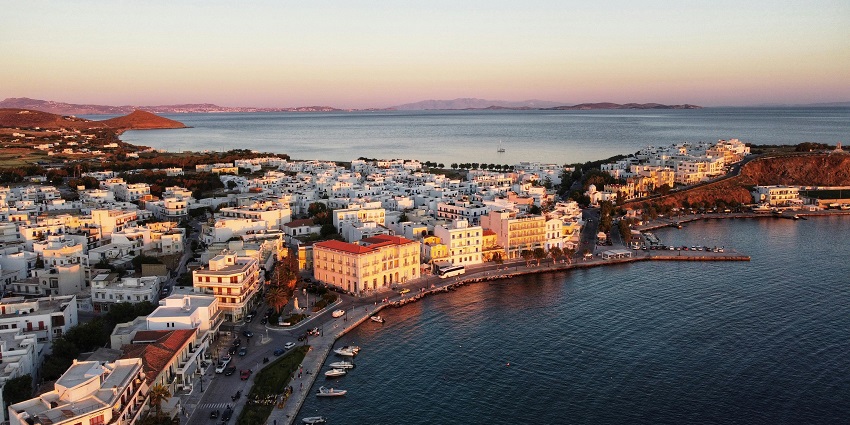 Island-hop through Greece’s whitewashed villages, turquoise waters, and seafood feasts